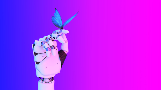 A butterfly poised on a robot finger
