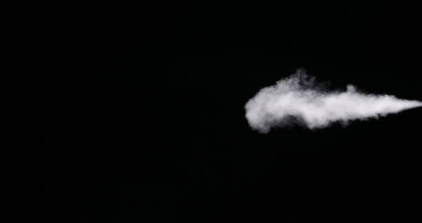 istock White Smoke Trail Isolated on Black Background 1169037427