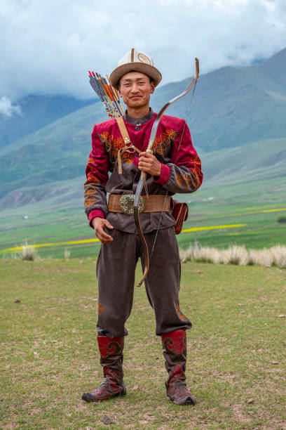 istock Traditional Kyrgyz Hunter Holding Traditional arrow. 1169038906