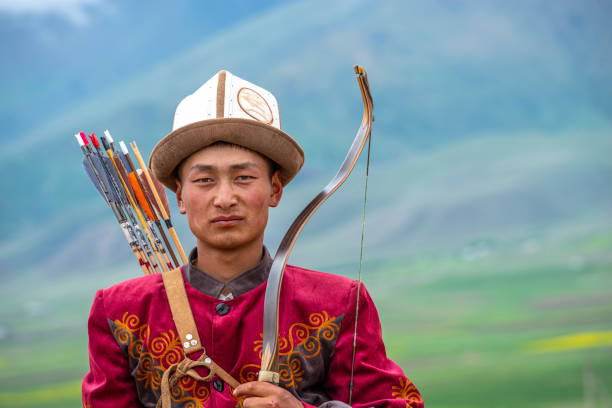 Traditional Kyrgyz Hunter Holding Traditional arrow.