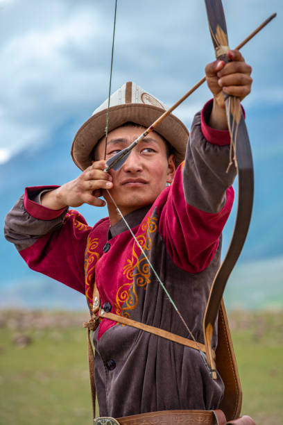 istock Traditional Kyrgyz Hunter Holding Traditional arrow. 1169038975