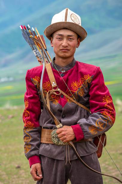 istock Traditional Kyrgyz Hunter Holding Traditional arrow. 1169038995
