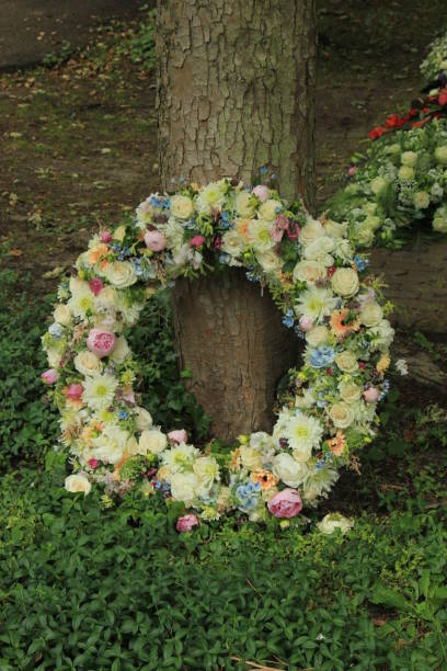 Sympathy wreath in pastel colors, made of various flowers