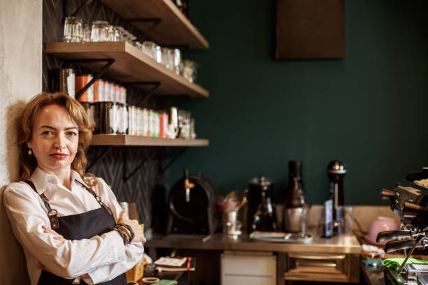 istock Confident barista at her workplace 1169041247