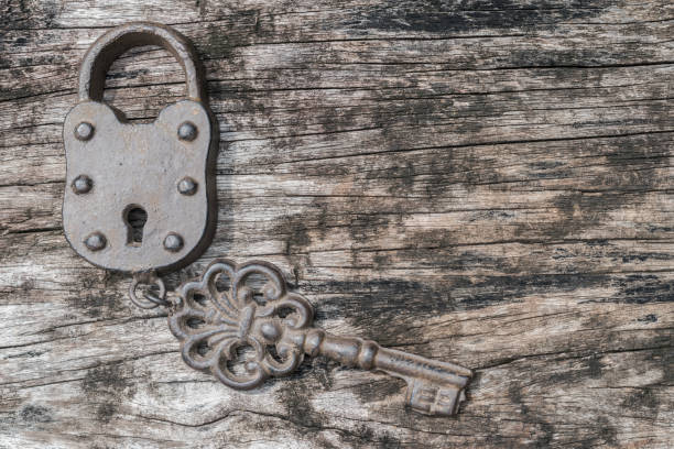 istock Rustic home key for door opening security concept 1169041448