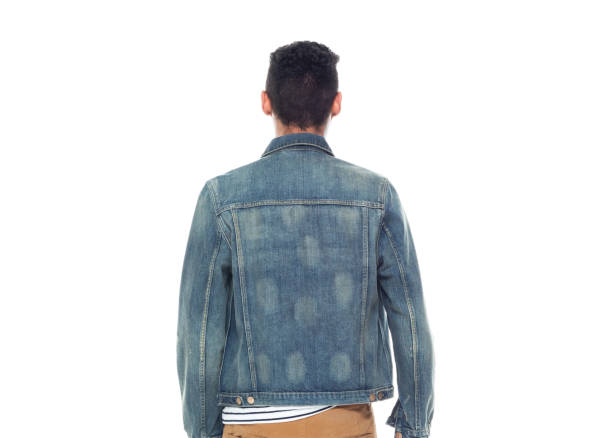 istock Good looking tall black man wearing denim jacket - hands by side 1169051561