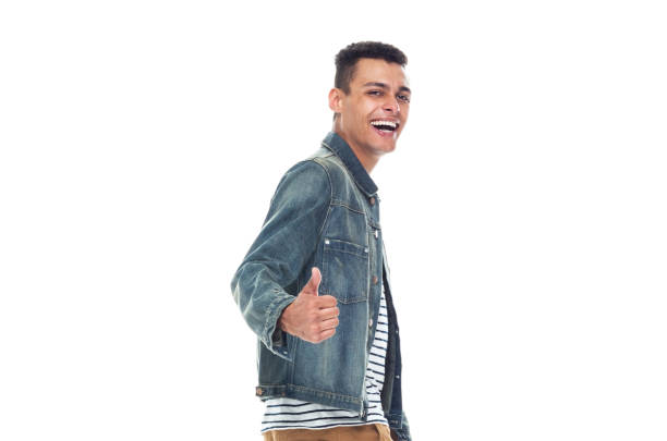istock Young black man wearing nice tredy clothes - walking and doing thumbs up 1169052084