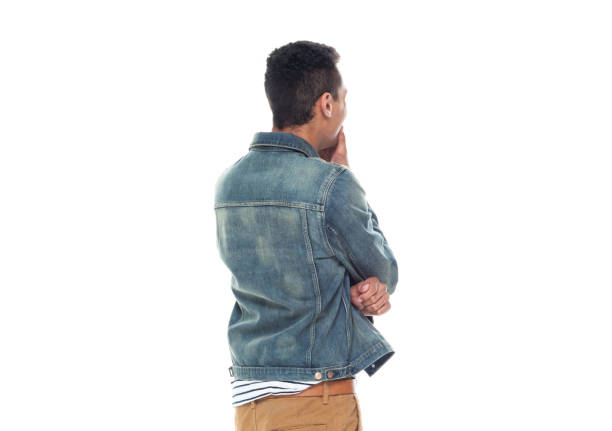 istock Good looking tall black man wearing denim jacket - is thinking 1169052480