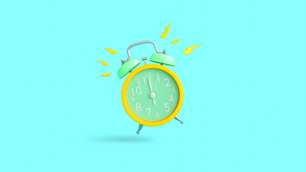 istock Yellow alarm clock was ringing at 6.00 1169053145