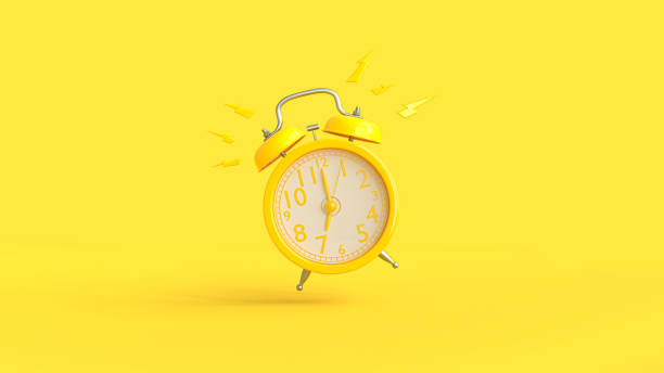 istock Yellow alarm clock was ringing at 7.00 1169053152