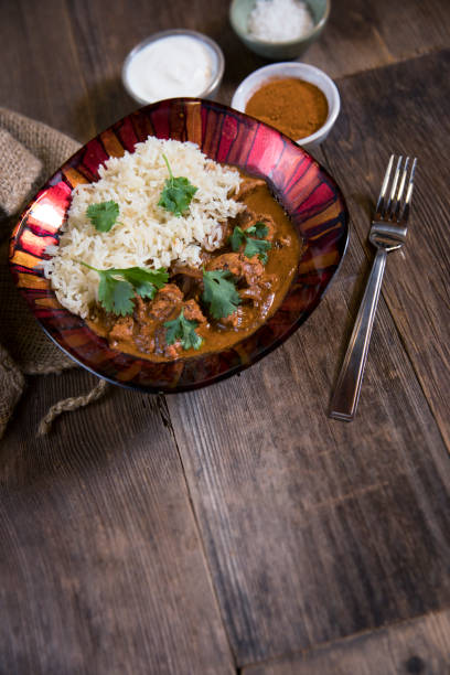 istock Indian Butter Chicken with Jasmine Rice in a bowl 1169054171