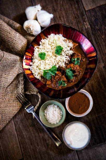 istock Indian Butter Chicken with Jasmine Rice in a bowl 1169054209