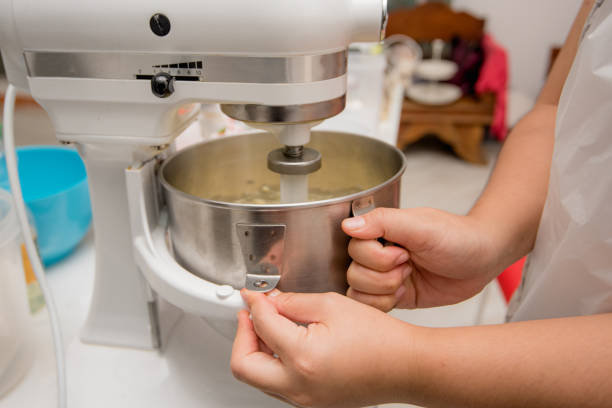 istock Flour and butter in dough mixing machine, bakery machine 1169057222