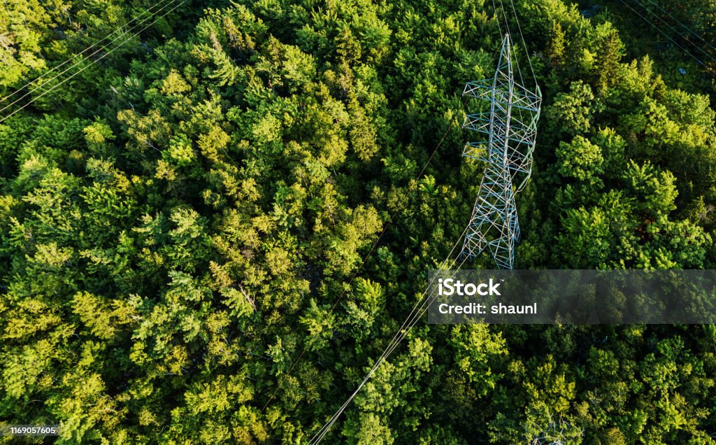 Aerial Drone View: Power Pylon Aerial view of a high voltage power pylon. Power Line Stock Photo