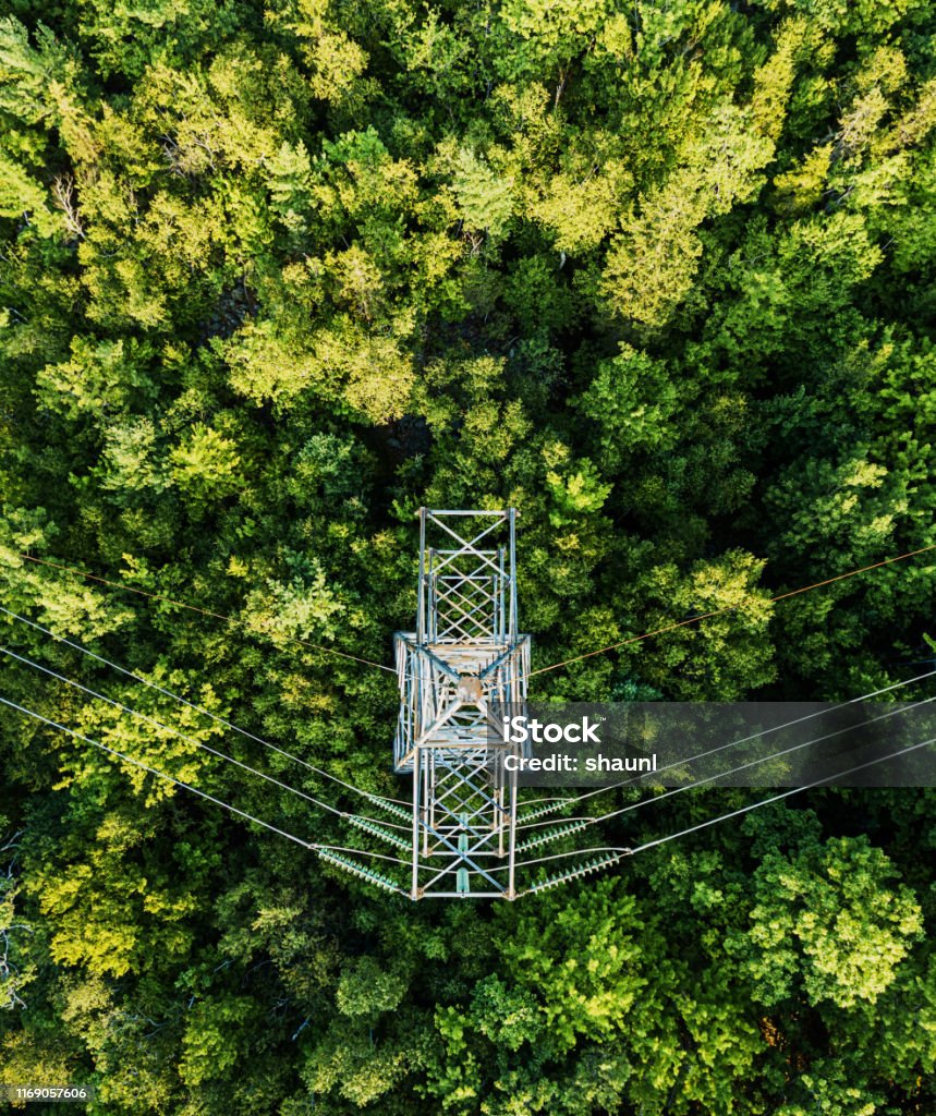 Aerial Drone View: Power Pylon Aerial view of a high voltage power pylon. Power Line Stock Photo