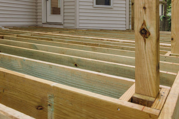 istock A new wooden, timber deck being constructed. it is on the decking. 1169058419