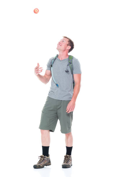 istock Friendly male hiker is holding an apple 1169061324