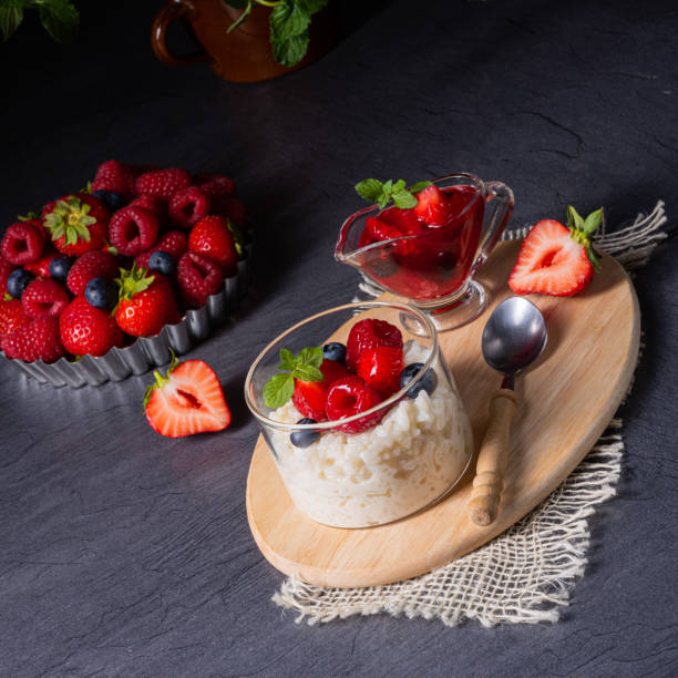 istock delicious milk rice with different berries and red fruit jelly 1169062373