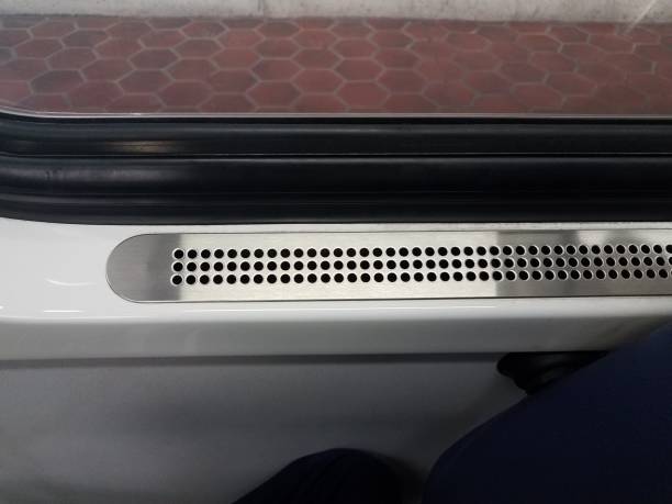 metal vent with holes near window on public train transportation metal vent with holes near window on public train transportation with hexagon tiles train air conditioner stock pictures, royalty-free photos & images