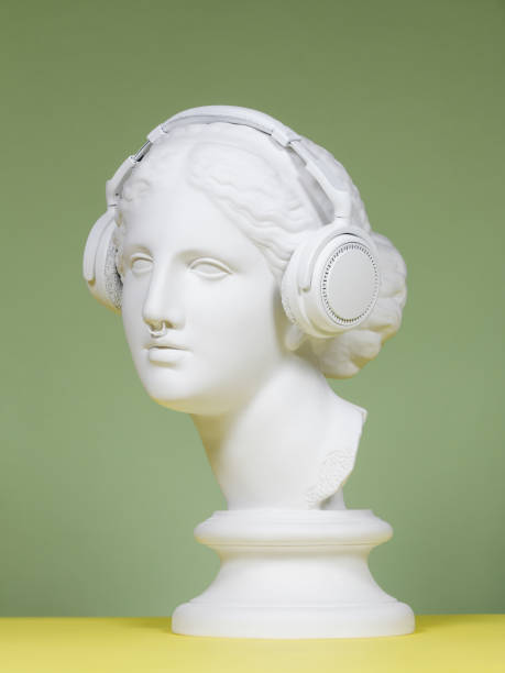 Modern Greek Goddess with headphones Plaster head model (mass produced replica of Head of Aphrodite of Knidos) with headphones, choker and septum piercing septum piercing stock pictures, royalty-free photos & images