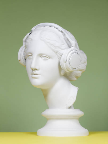 modern greek goddess with headphones - classical greek audio imagens e fotografias de stock