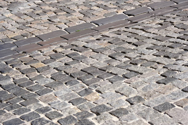 istock Background of cobblestone pavement 1169067191
