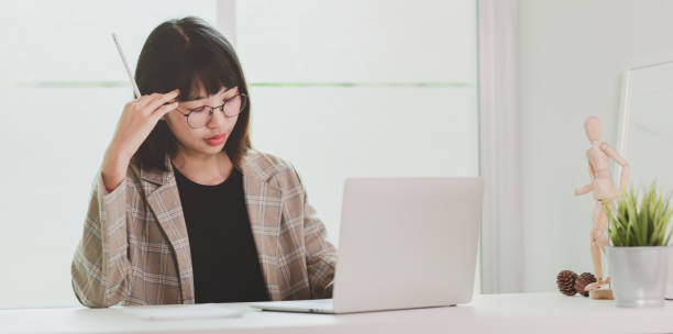 istock Businesswoman solving her problem about her upcoming project 1169069446