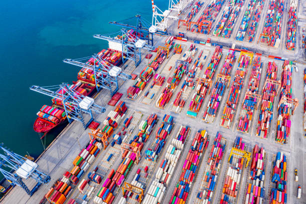 Top view of Deep water port with cargo ship and containers. It is an import and export cargo port where is a part of shipping dock and export products worldwide stock photo