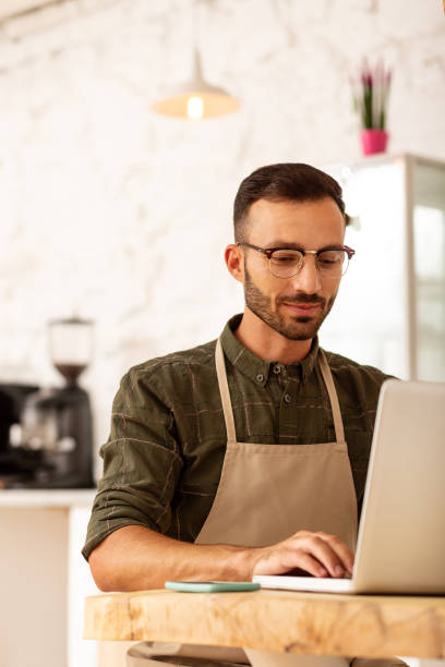 istock Owner of coffee shop developing business strategy 1169071832