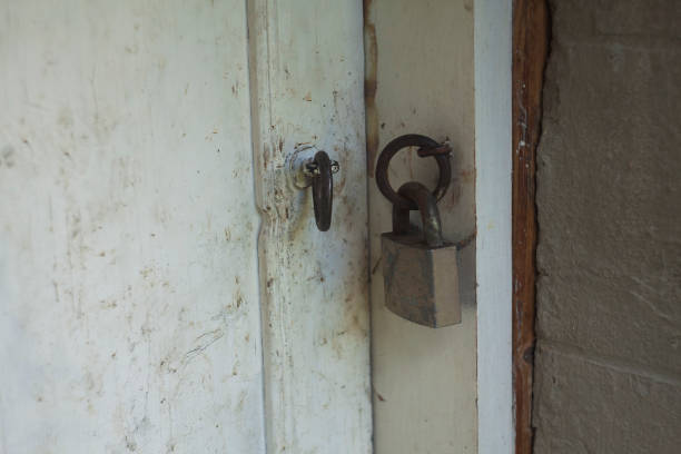 istock old lock on wooden door 1169074336