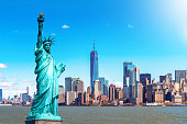 istock The Statue of Liberty with the One world Trade building center over hudson river and New York cityscape background, Landmarks of lower manhattan New York city. Architecture and building concept 1169074379