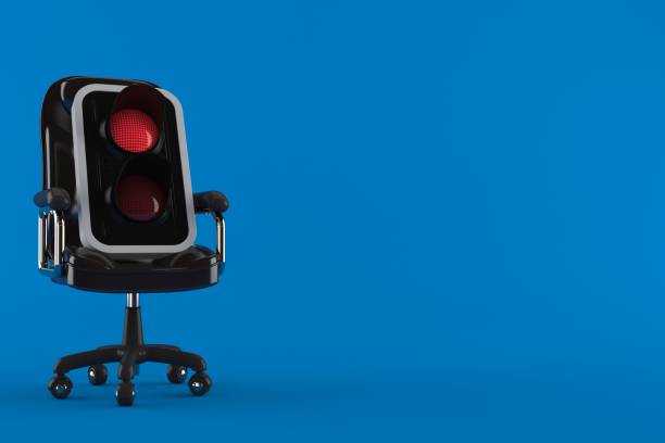 istock Red traffic light on business chair 1169074451
