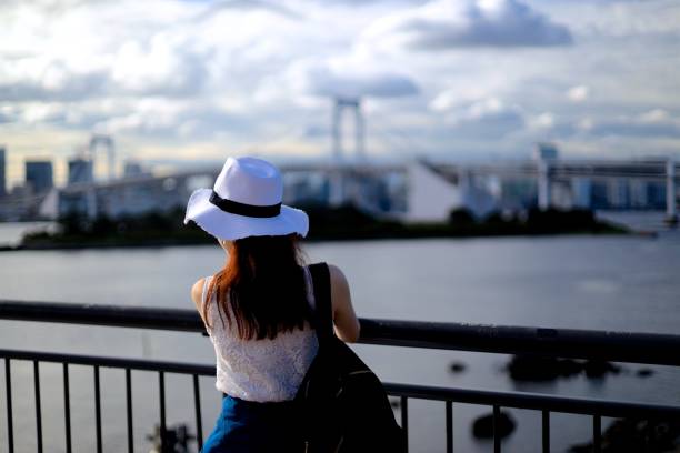 istock Yoping beautiful female enjoying landscape at coarst 1169077234