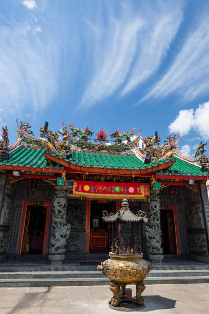 istock chinese temple roofs and dramatic clouds 1169077415