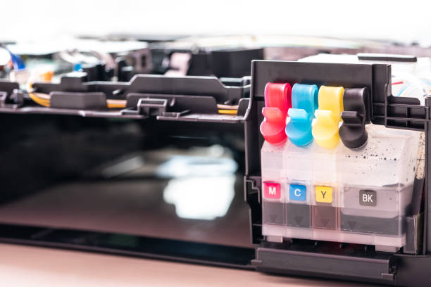 istock Ink cartridges in refilled ink jet printer. 1169079268