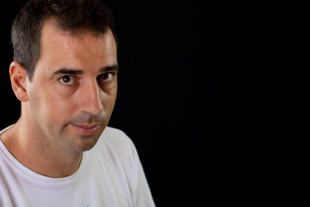 handsome man in gray t-shirt emotions close up. High quality photo