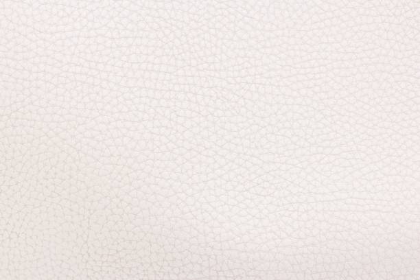istock Beautiful white leather textured backdrop for your design. Seamless beige colored fabric texture. Ivory color paper background. 1169086379
