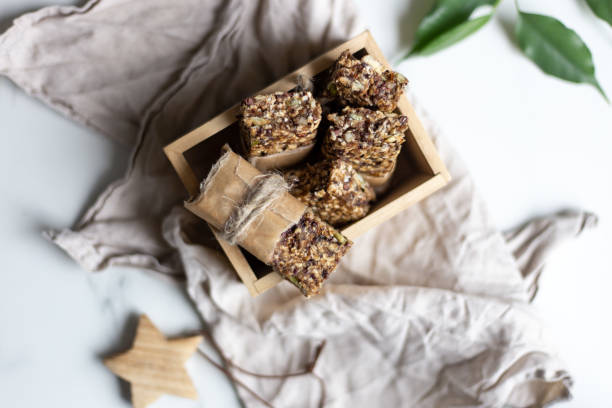 Granola bar. Healthy snack on marble background with copy space
