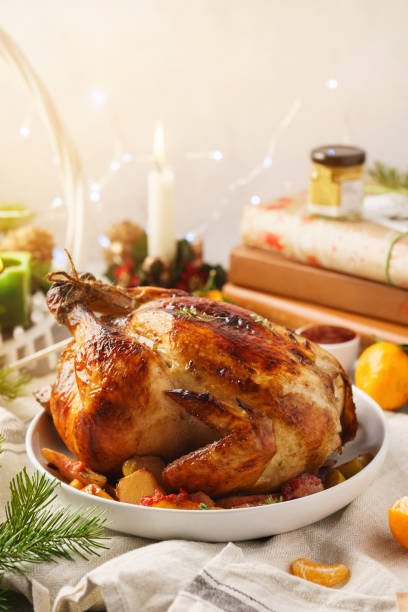 istock Traditional Christmas roast chicken with thyme and apples. 1169093393