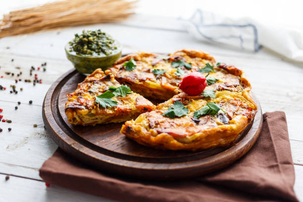 istock baked vegetable pie with sauce pesto 1169096310