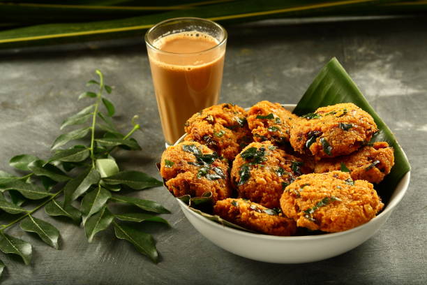 istock Kerala foods- parippu vada and milk tea. 1169097627