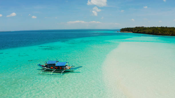 istock Sandy beach in the lagoon with turquoise water. Balabac, Palawan, Philippines 1169097713