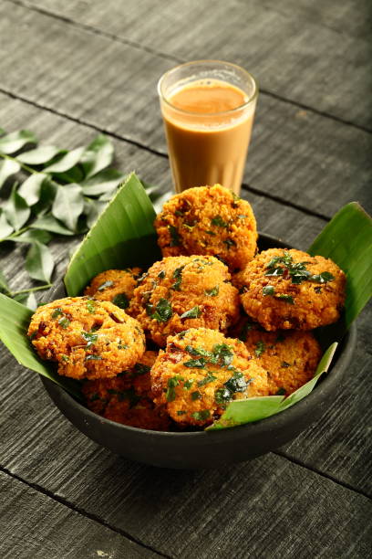 istock Kerala foods- parippu vada and milk tea. 1169097755
