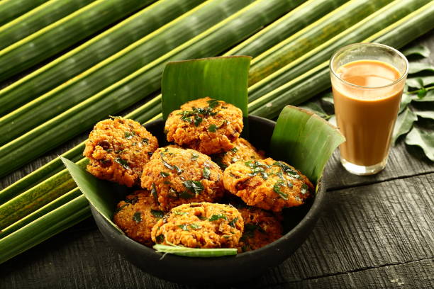 istock Kerala foods- parippu vada and milk tea. 1169097758