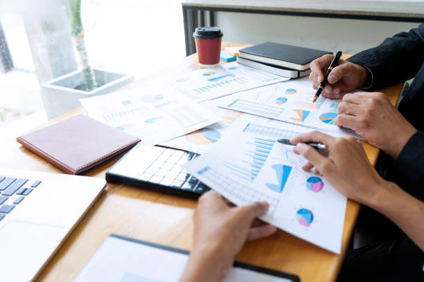 istock Businessman coaching office staff 1169098928