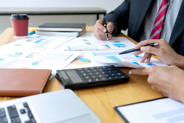 istock Businessman coaching office staff 1169098932
