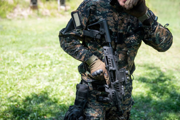 istock Military man at the Shooting Range 1169100266