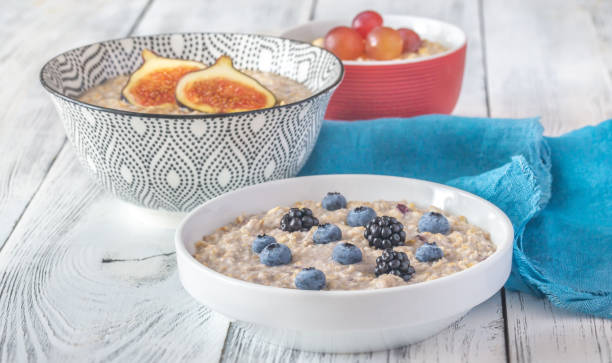 istock Three bowls of oatmeal 1169100381