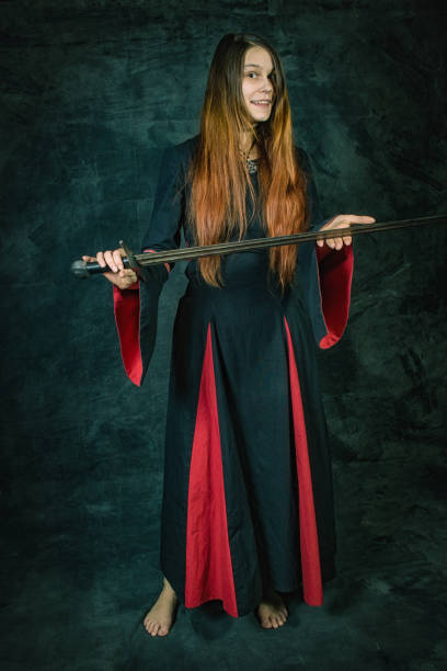 istock Woman with sword 1169100419