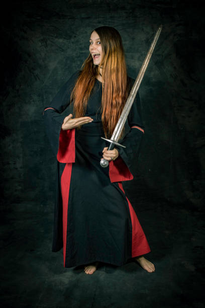 istock Woman with sword 1169100422